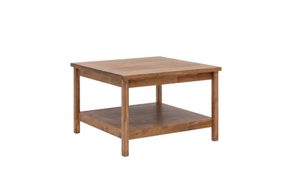 A square-shaped, brown solid pine wood handmade coffee table with a storage shelf underneath. The table is varnished and has smooth oval wood edges.