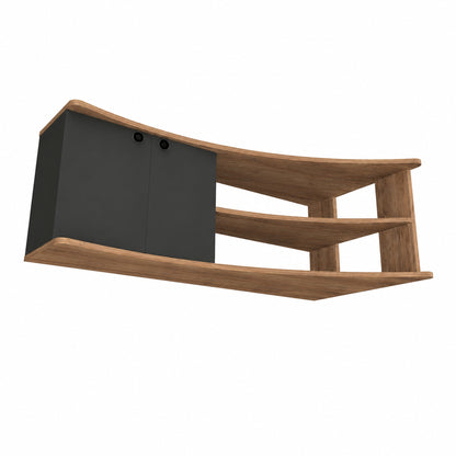 A curved wooden media console cabinet with a dark gray door on the left and two open wooden shelves on the right, shown against a plain white background.